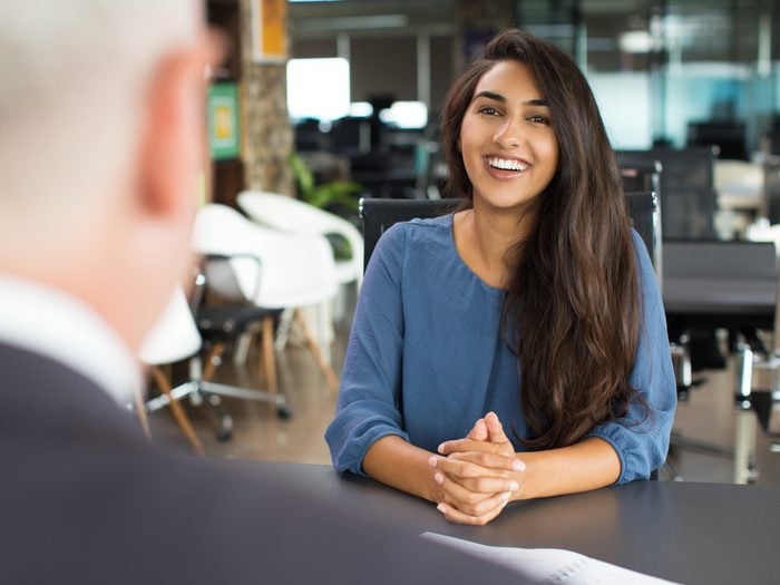Smiling woman at job interview