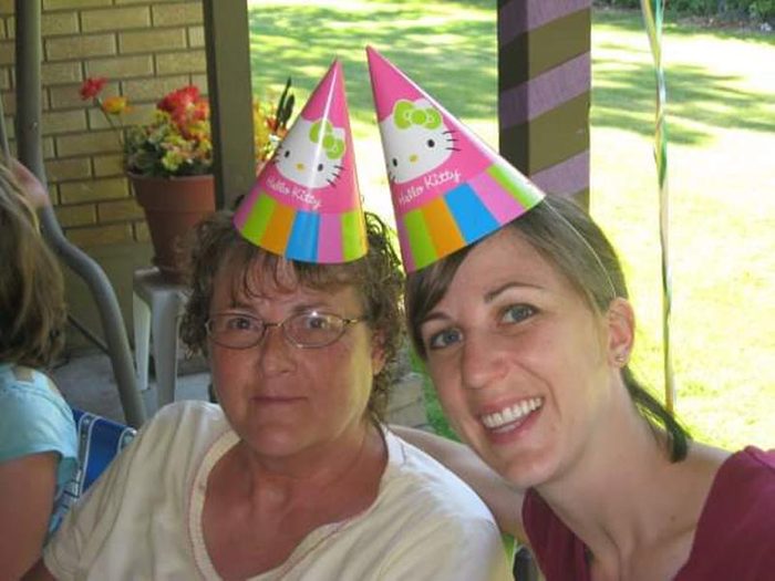 Janette Kudin and mother in party hats