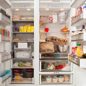 Open Refrigerator With Stocked Food Products