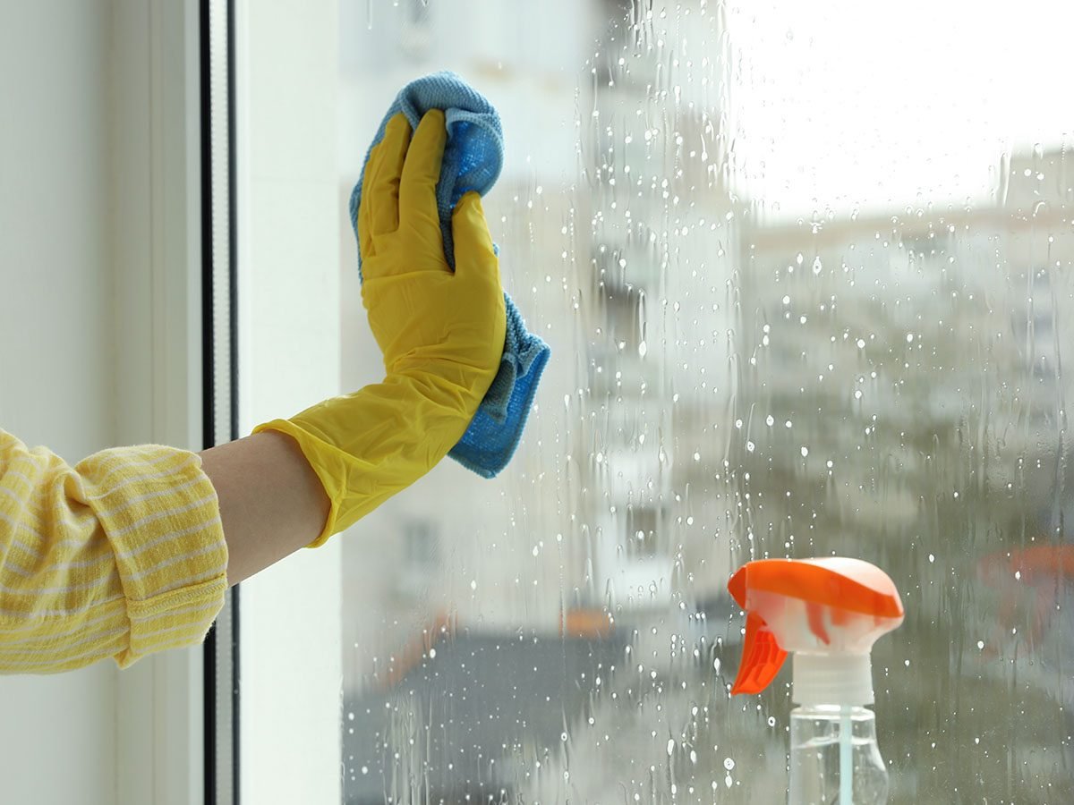 Person Cleanig Window