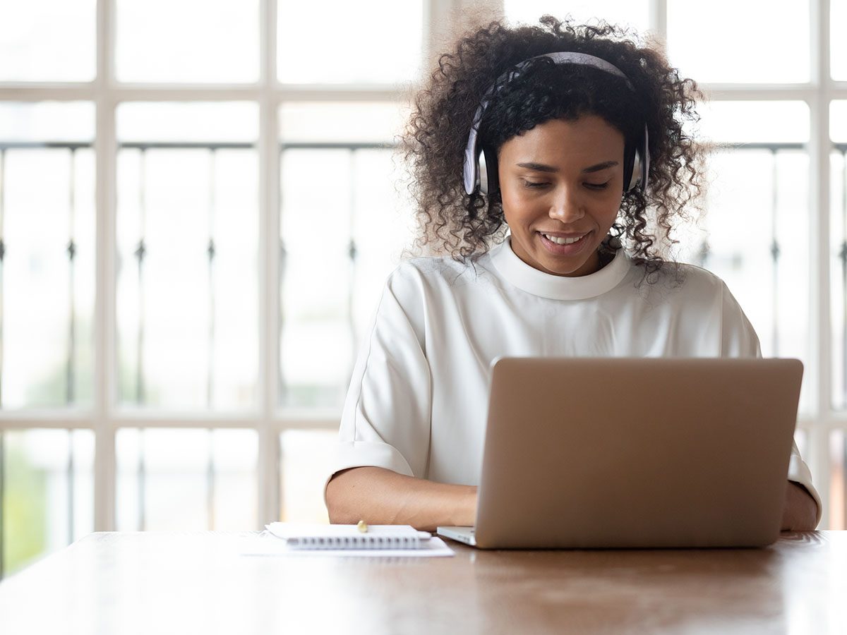 women in online class on laptop