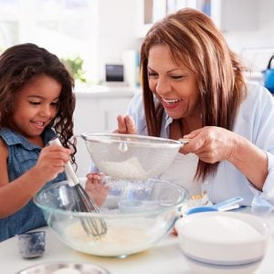 Grandma's secret baking tips - Grandma baking with granddaughter