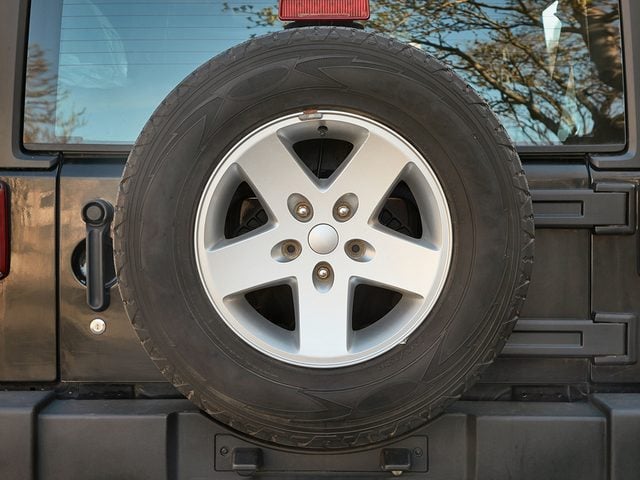 vintage car features - spare tire mounted on jeep