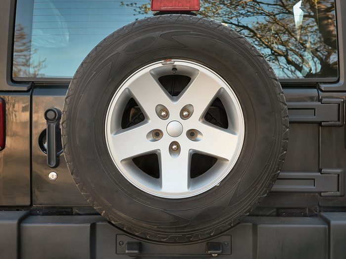 vintage car features - spare tire mounted on jeep