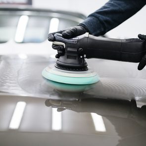 car wax facts - waxing car with orbital polisher
