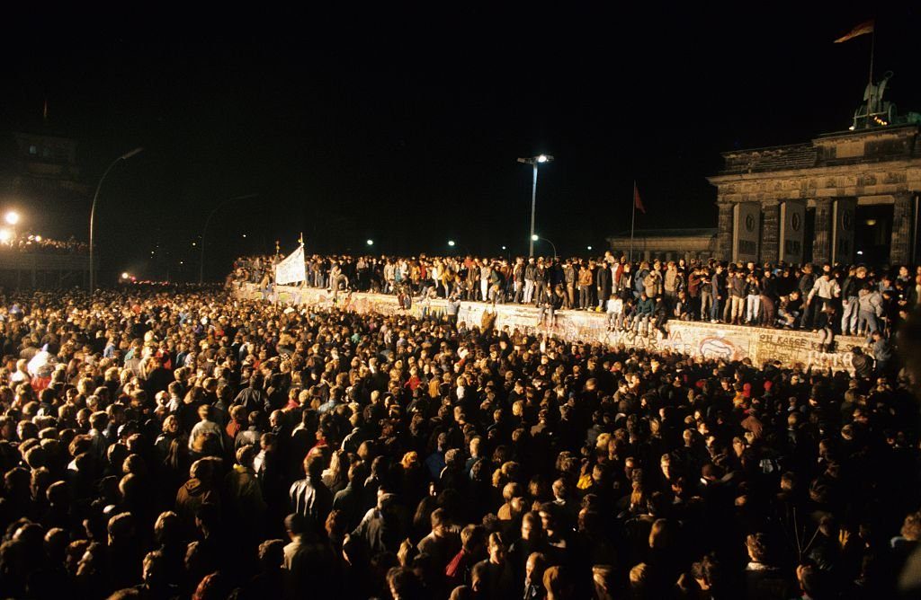 Germany / GDR, Berlin. The fall of the wall. People at the Brandenburg Gate. 13.11.1989