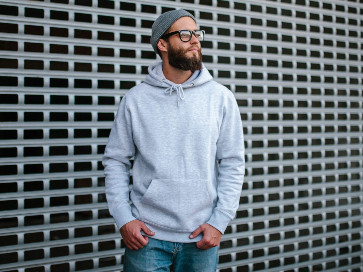 Millennial wearing a hoodie sweatshirt