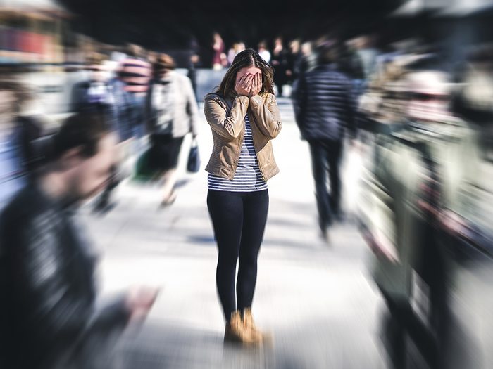 How to be brave - woman having panic attack in crowded place
