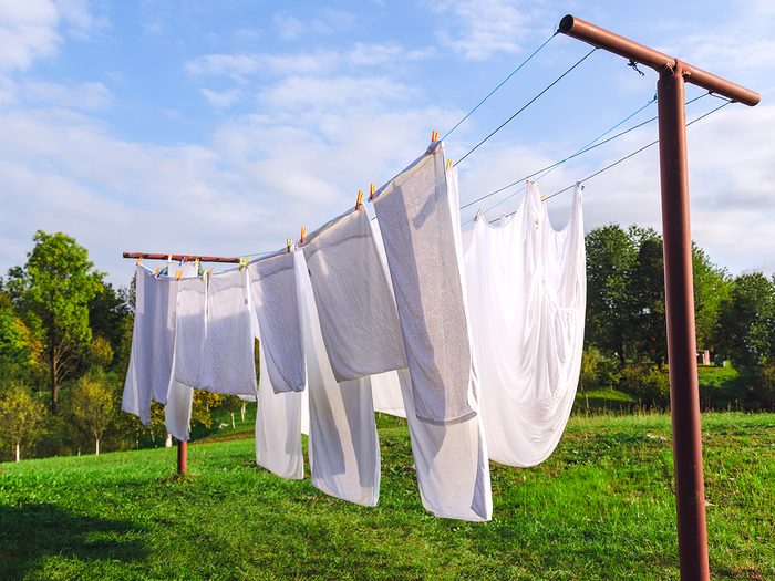 laundry tips - white clothes hanging on line