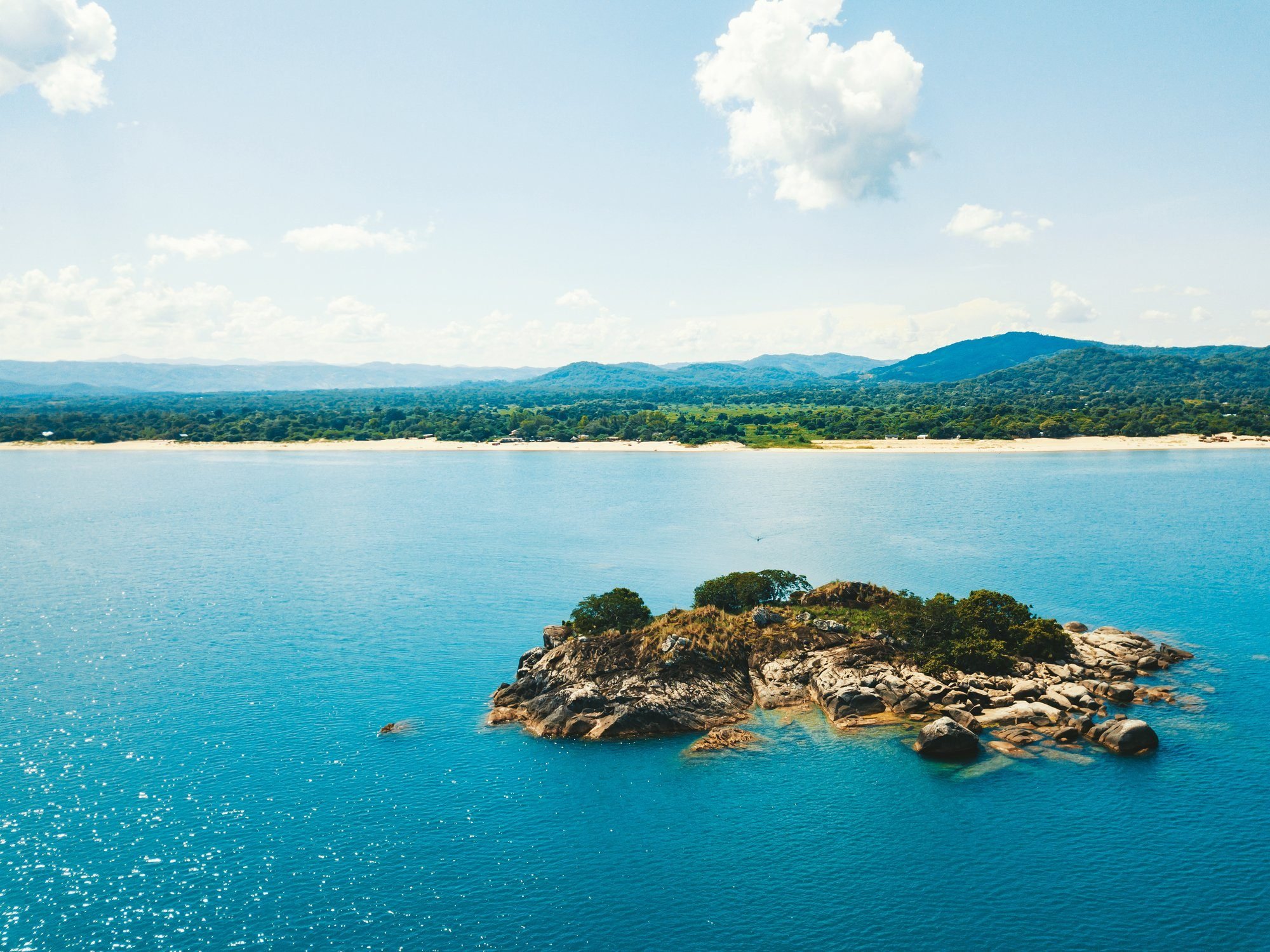 lake malawi with tiny island in the