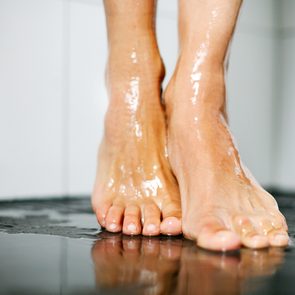 Body parts you're washing all wrong - female feet in shower