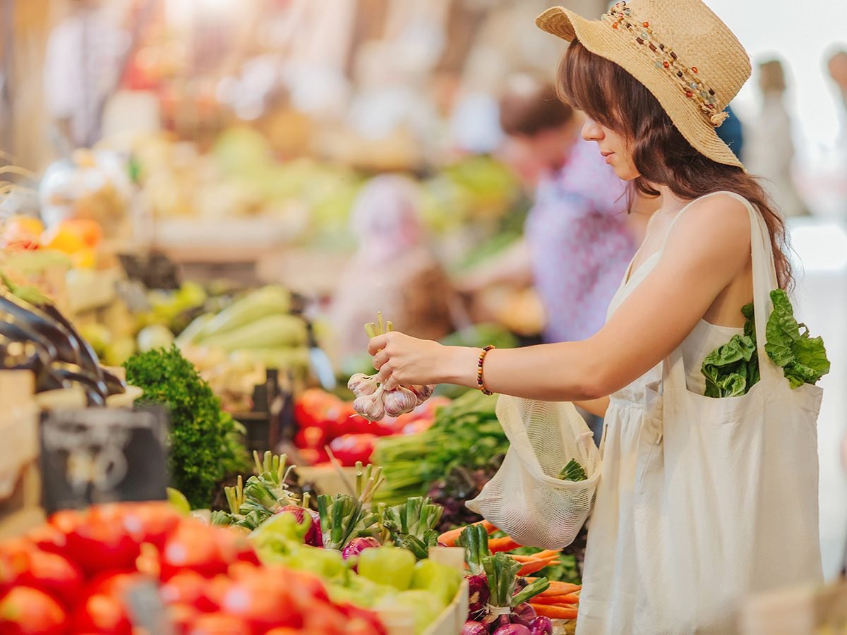 Good news - woman shopping for fresh produce