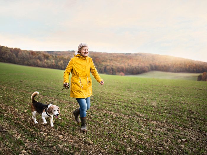 How to make walking less boring - woman walking dog