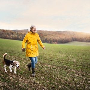 How to make walking less boring - woman walking dog