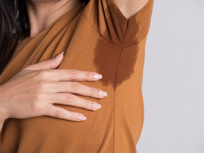 How To Sweat Less This Summer - Sweat Stains on Shirt