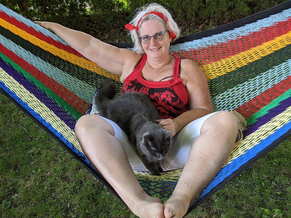 In the backyard photography - on the hammock with a cat