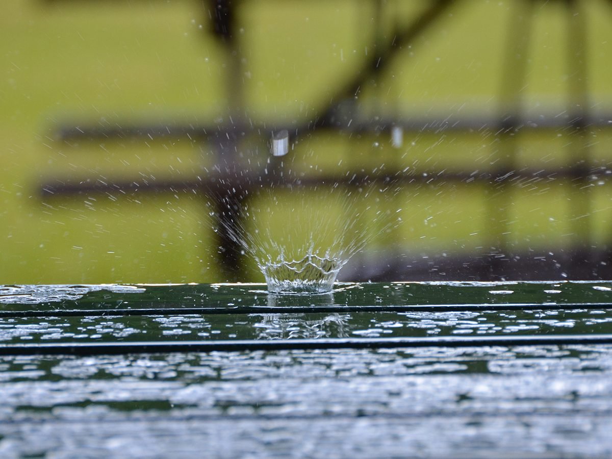 In the backyard photography - raindrop on a picnic table