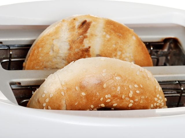 Bagel in toaster slices facing inward