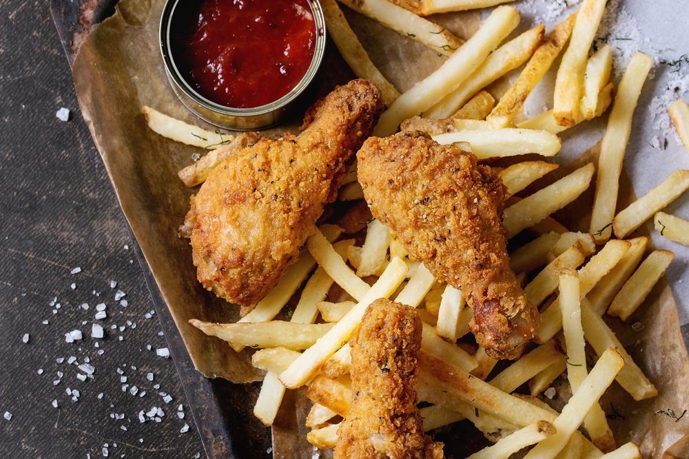 Fried chicken legs with french fries