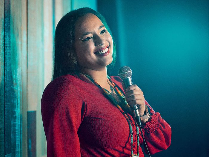 Comedian Janelle Niles on stage at Indigenous comedy show Got Land?