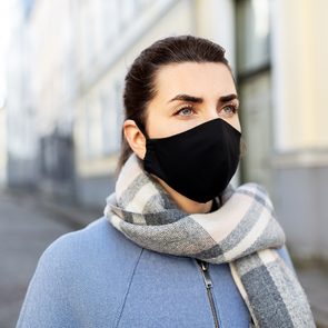 New face mask recommendations - Woman wearing disposable face mask