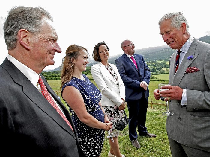 Prince Charles greeting people