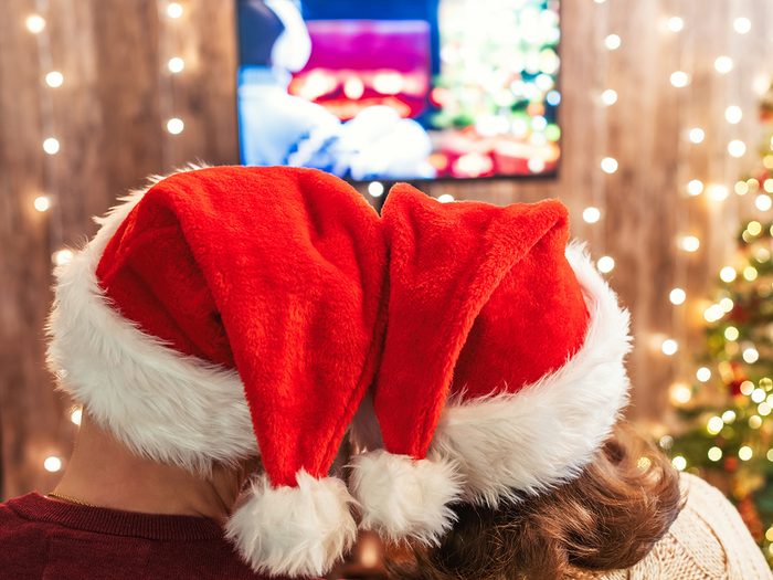 Best Christmas shows on Netflix - Couple watching TV