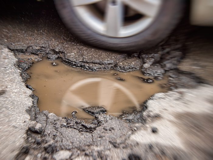 Car noises - hitting pothole in road