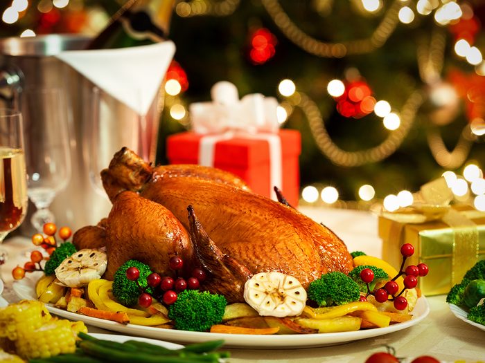 Christmas Turkey dinner served in front of a Christmas tree