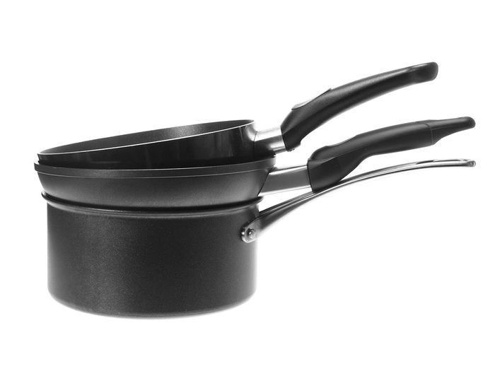 Cooking mistakes - stack of pots and pans
