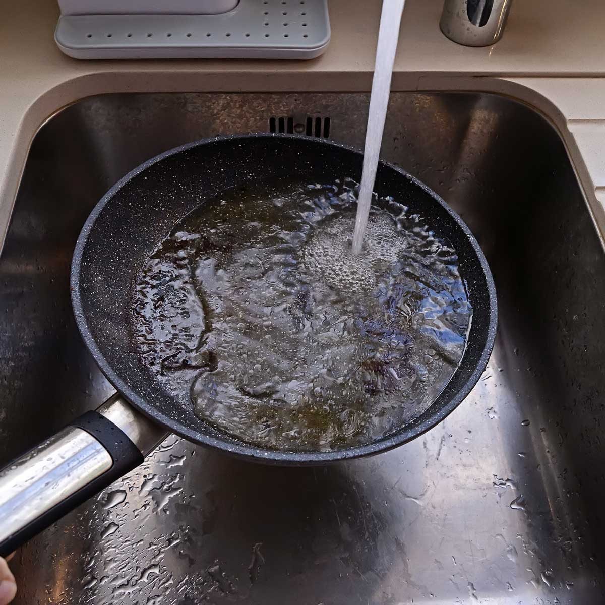 Pouring grease down the drain