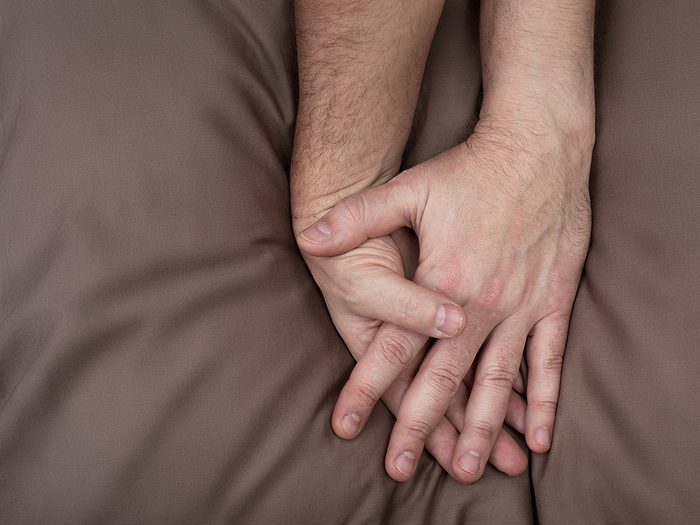 How to be a better lover - holding hands in bed