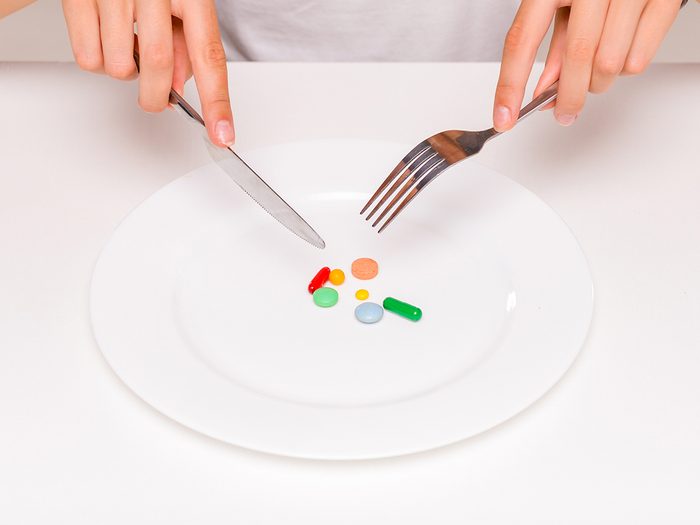 Supplements should not be meal replacements - pills on plate