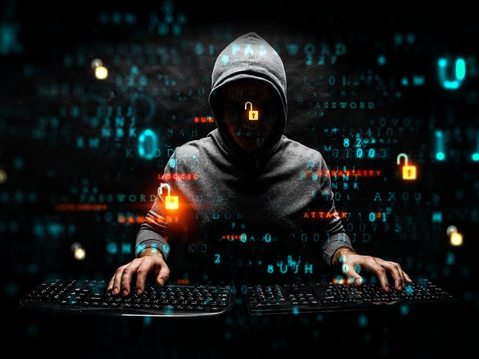 Cybercriminal - hacker compromising online security