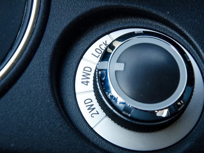 Four wheel drive selector button