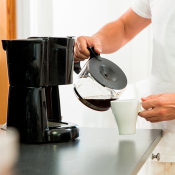 Mistakes everyone makes brewing coffee - man pouring coffee into cup