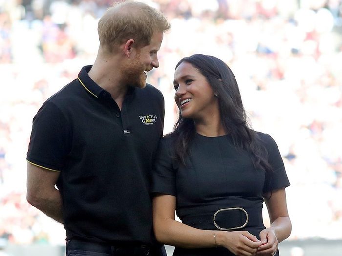 LONDON, ENGLAND - JUNE 29: Prince Harry, Duke of Sussex and Meghan, Duchess of Sussex accompany Invictus Games competitors on the field for the ceremonial first pitch before game one of the London Series between the New York Yankees and the Boston Red Sox at London Stadium on Saturday, June 29, 2019 in London, England. (Photo by Alex Trautwig/MLB via Getty Images)