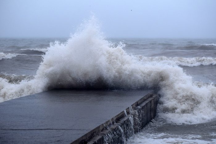 Weather Pictures - Storm Surge Waves Crashing Pier
