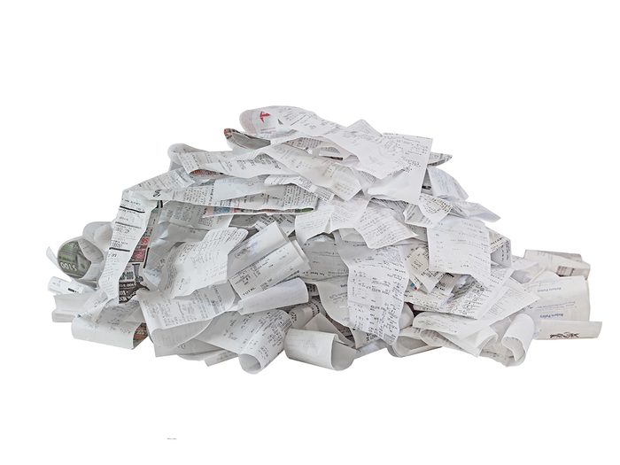 Car clutter - stack of receipts