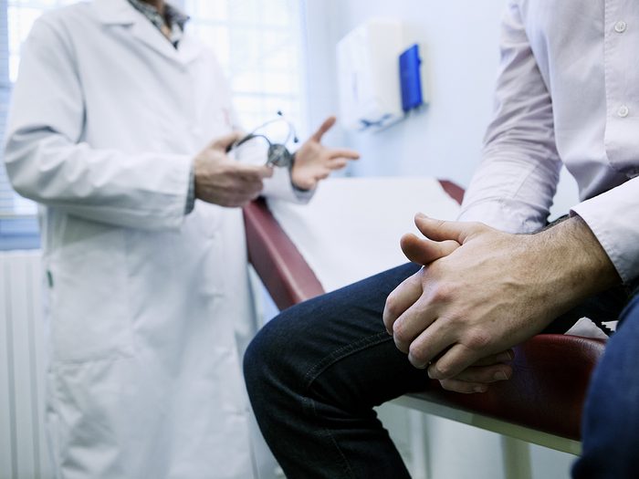 Health mistakes men make - man seeing doctor