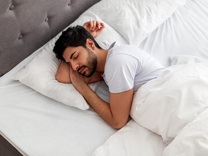 How to get deeper sleep -man sleeping peacefully