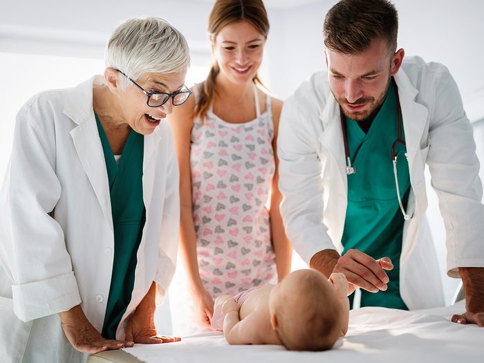 Baby terms - doctors examining baby