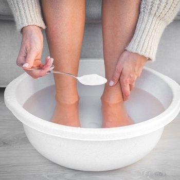 Baking soda uses - woman using footbath