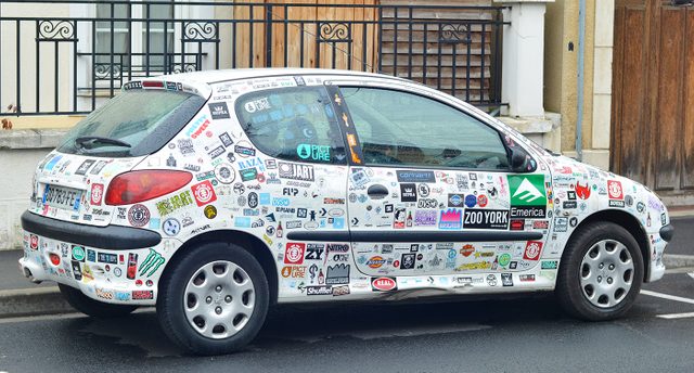 Car covered in bumper stickers