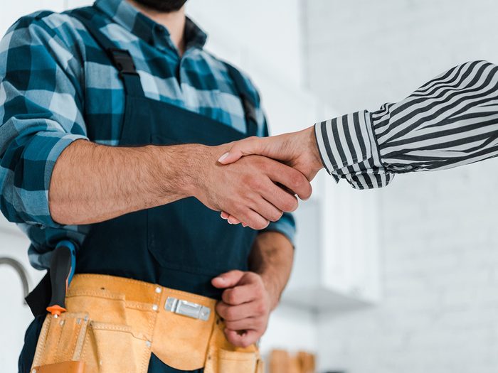 Hire a handyman - shaking hands