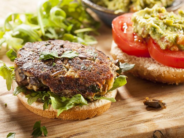 Best vegetables for weight loss - Homemade Organic Vegetarian Mushroom Burger with tomato and guacamole