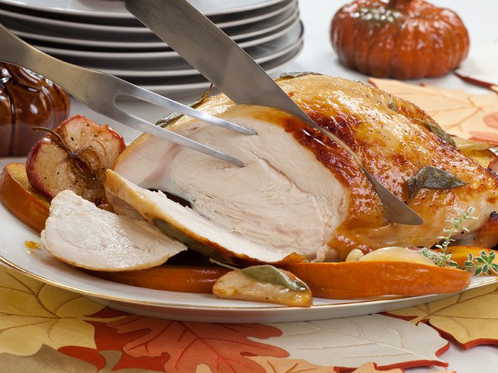 Carving turkey at Thanksgiving