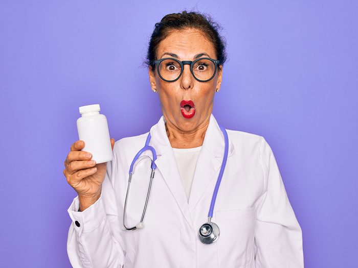 Doctor jokes - doctor holding pill bottle