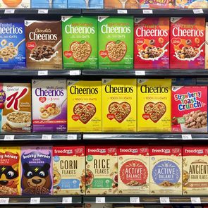 Shrinkflation - General Mills cereal boxes at grocery store