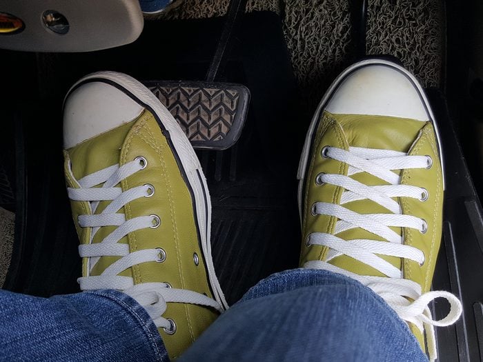 things you should never do to your car - Green shoes while drive car